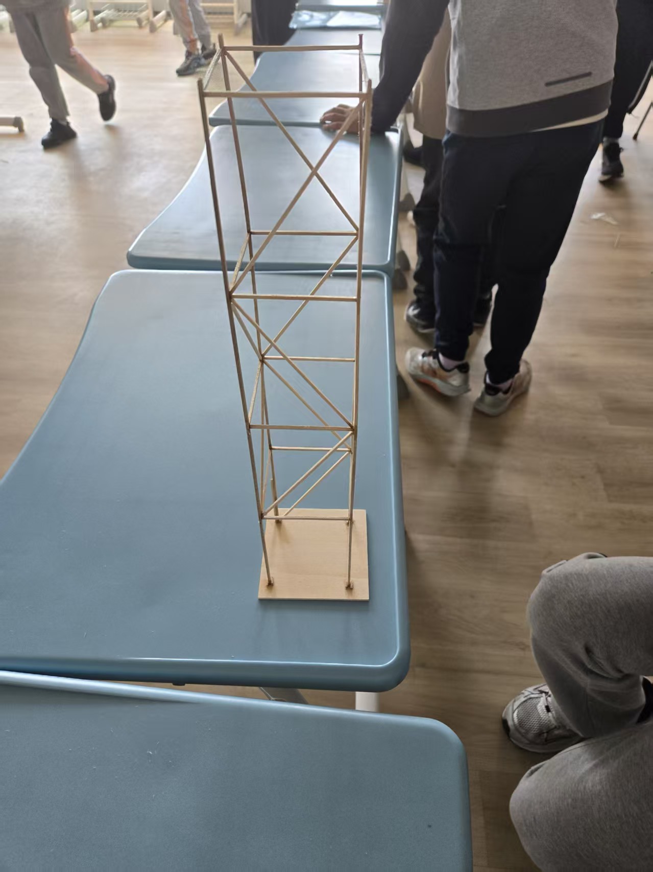 The balsa wood truss tower model on the classroom desk